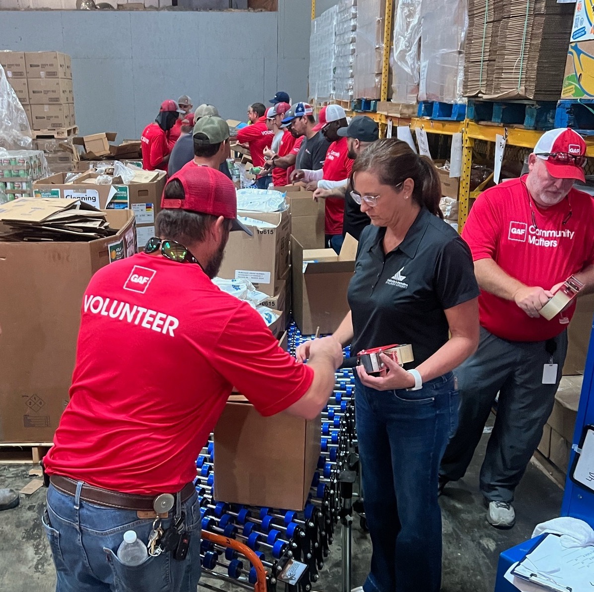 GAF packing boxes at food bank