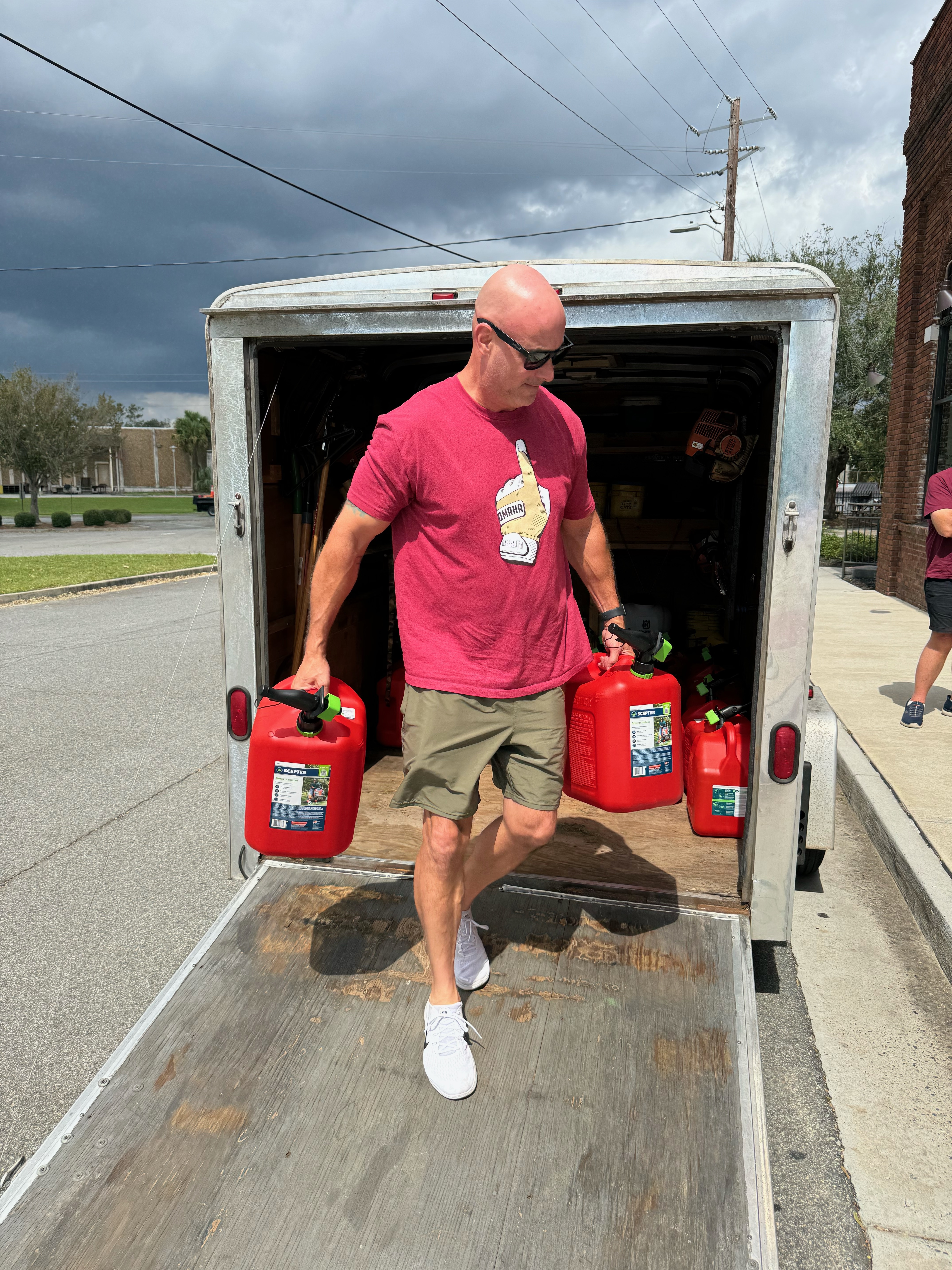 person delivering gas can